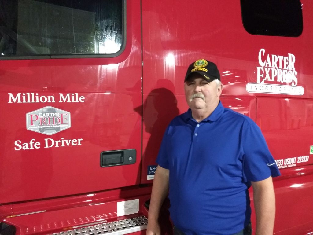 Don Talley in front of truck